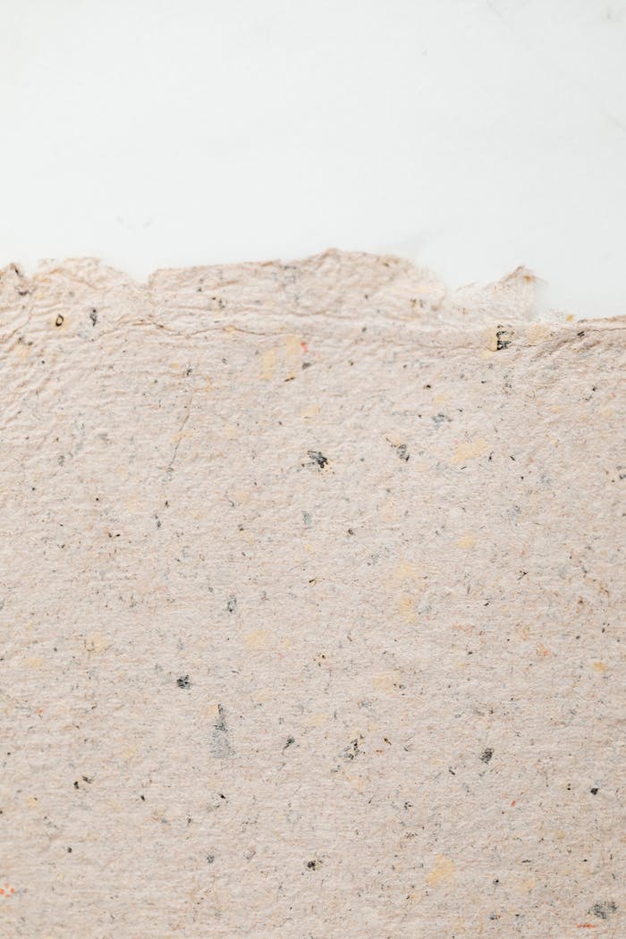 who-we-are Close-up shot of textured recycled paper with ample copy space for design projects.